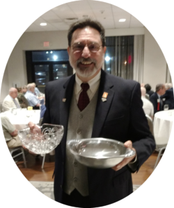 Anthony Dewey with his Multi Frame and Single Frame Grand Awards